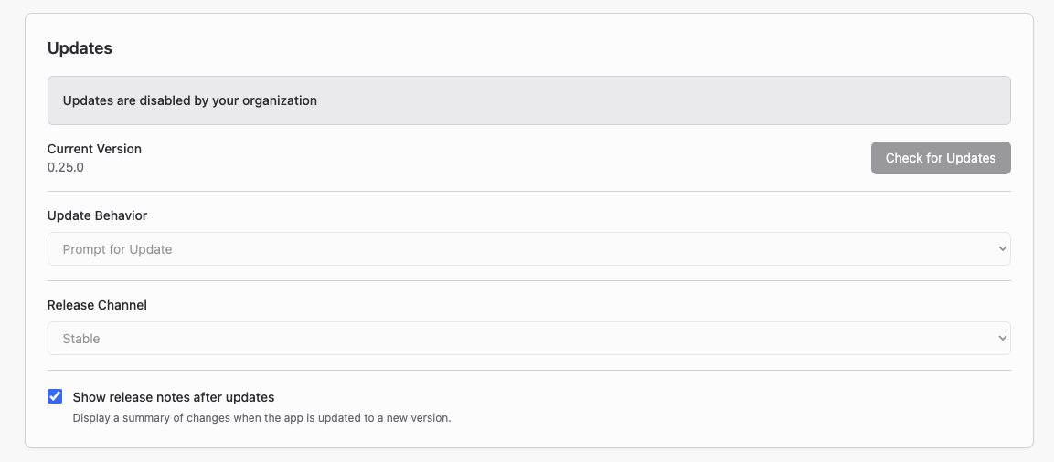 App Settings 中的 Updates 區塊，在停用的 Check for Updates 按鈕、Update Behavior 選單與 Release Channel 選單上方顯示「Updates are disabled by your organization」提示訊息